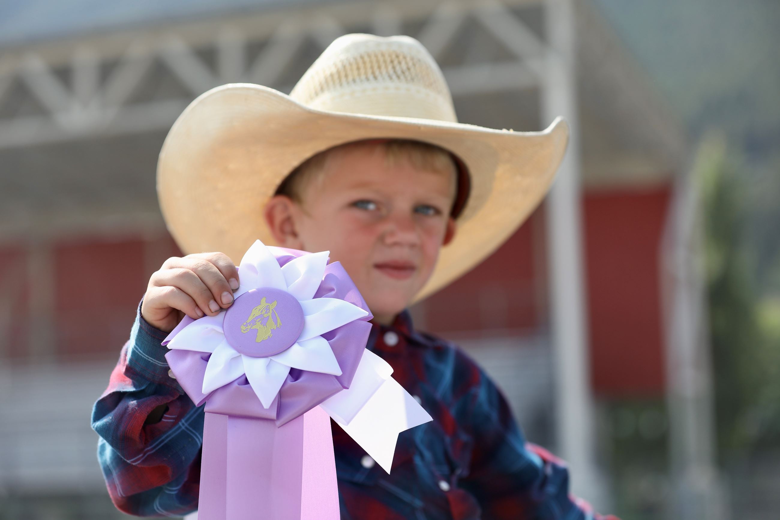 Slayton Holds Ribbon